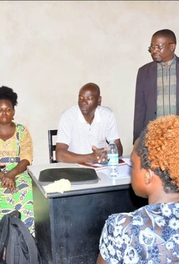 Community meeting organized by Pan African Club scoping the effects of pollution by manufacturing companies on surrounding communities in Kawempe Division