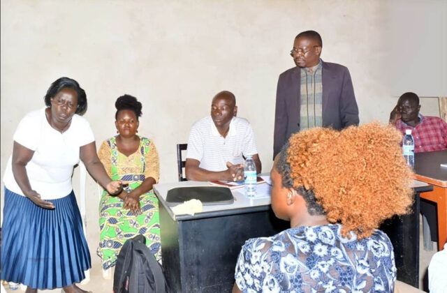 Community meeting organized by Pan African Club scoping the effects of pollution by manufacturing companies on surrounding communities in Kawempe Division