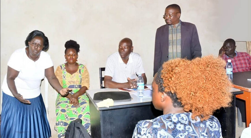Community meeting organized by Pan African Club scoping the effects of pollution by manufacturing companies on surrounding communities in Kawempe Division