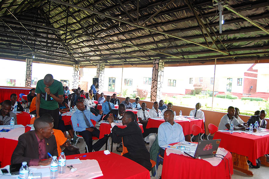 Participants at Youth Mps standing with the students at the Oil discovery in Bunyoro; opportunitiesAnd challenges to the youth conference